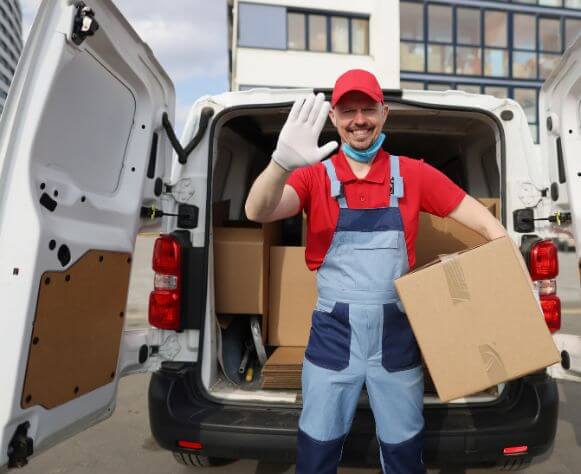 courier-takes-cardboard-box-out-of-van